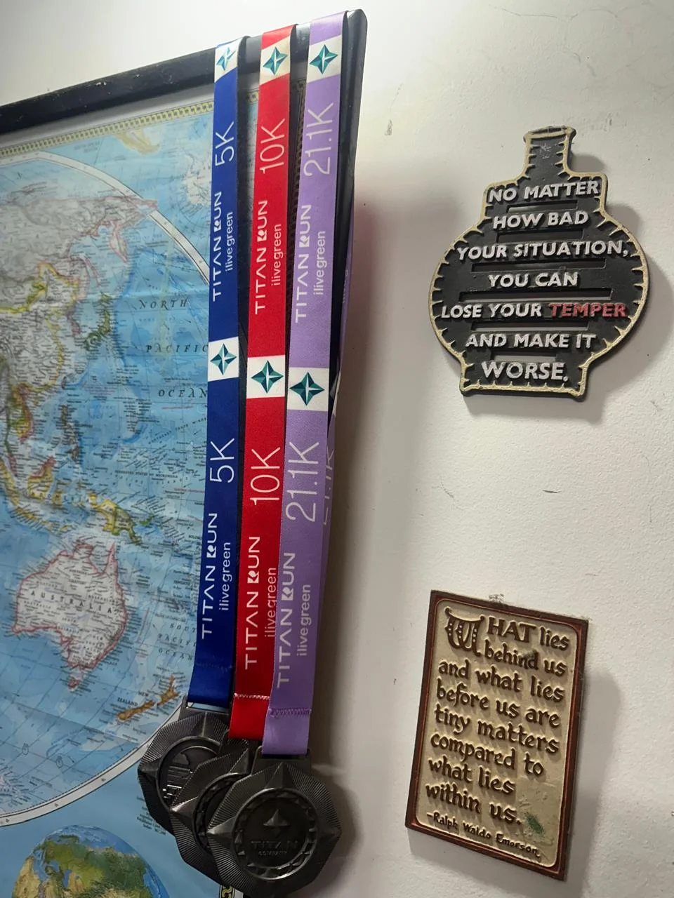 Dr. Vijay Manikoth's Titan Run medals for 5km, 10km and 21.1km distances
